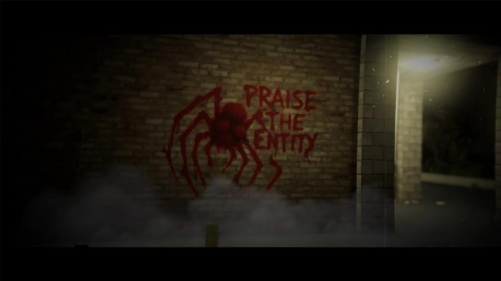 Praise the entity graffiti on brick wall of red spider