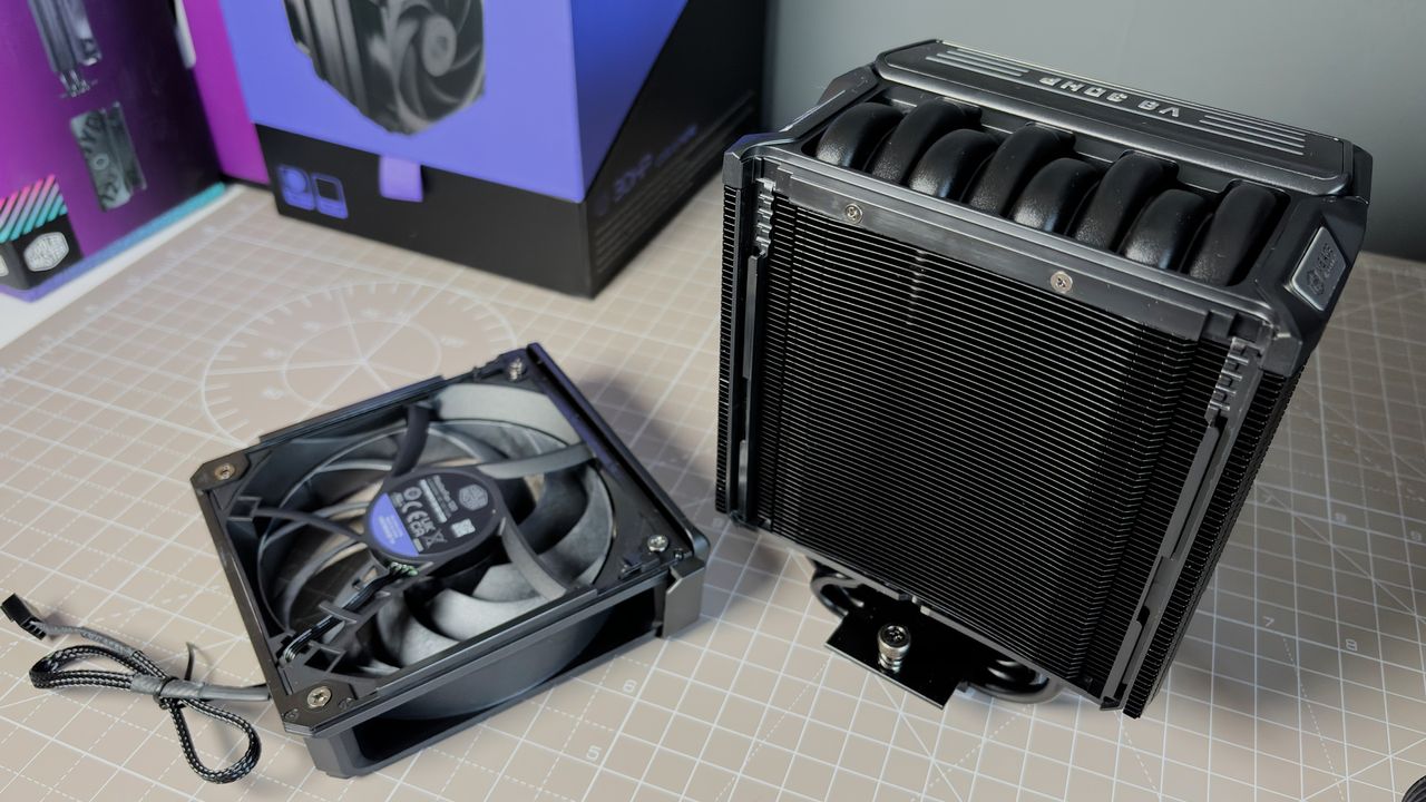 The Cooler Master V8 Ace 3DHP installed on a test bench and on its box.