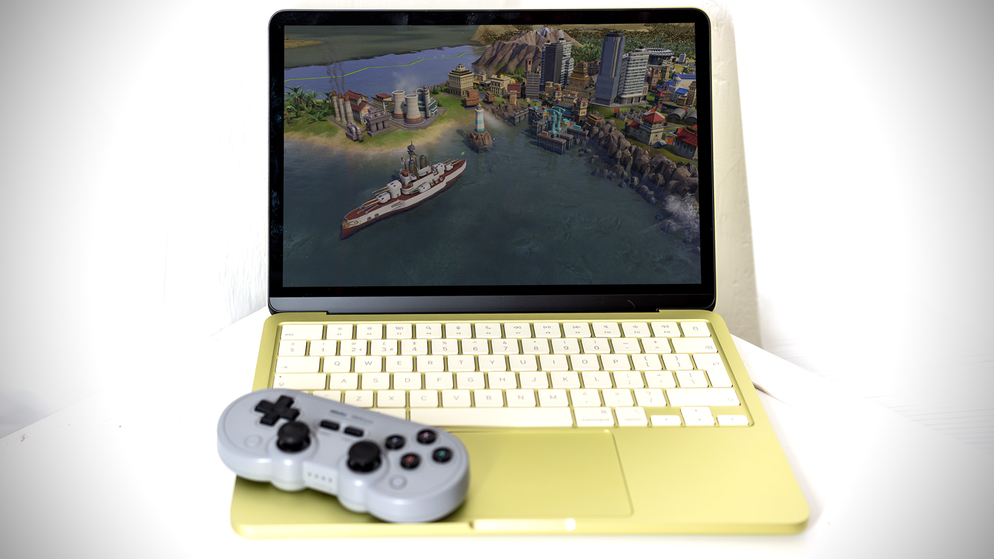 Apple MacBook Neo in Citrus colour.
