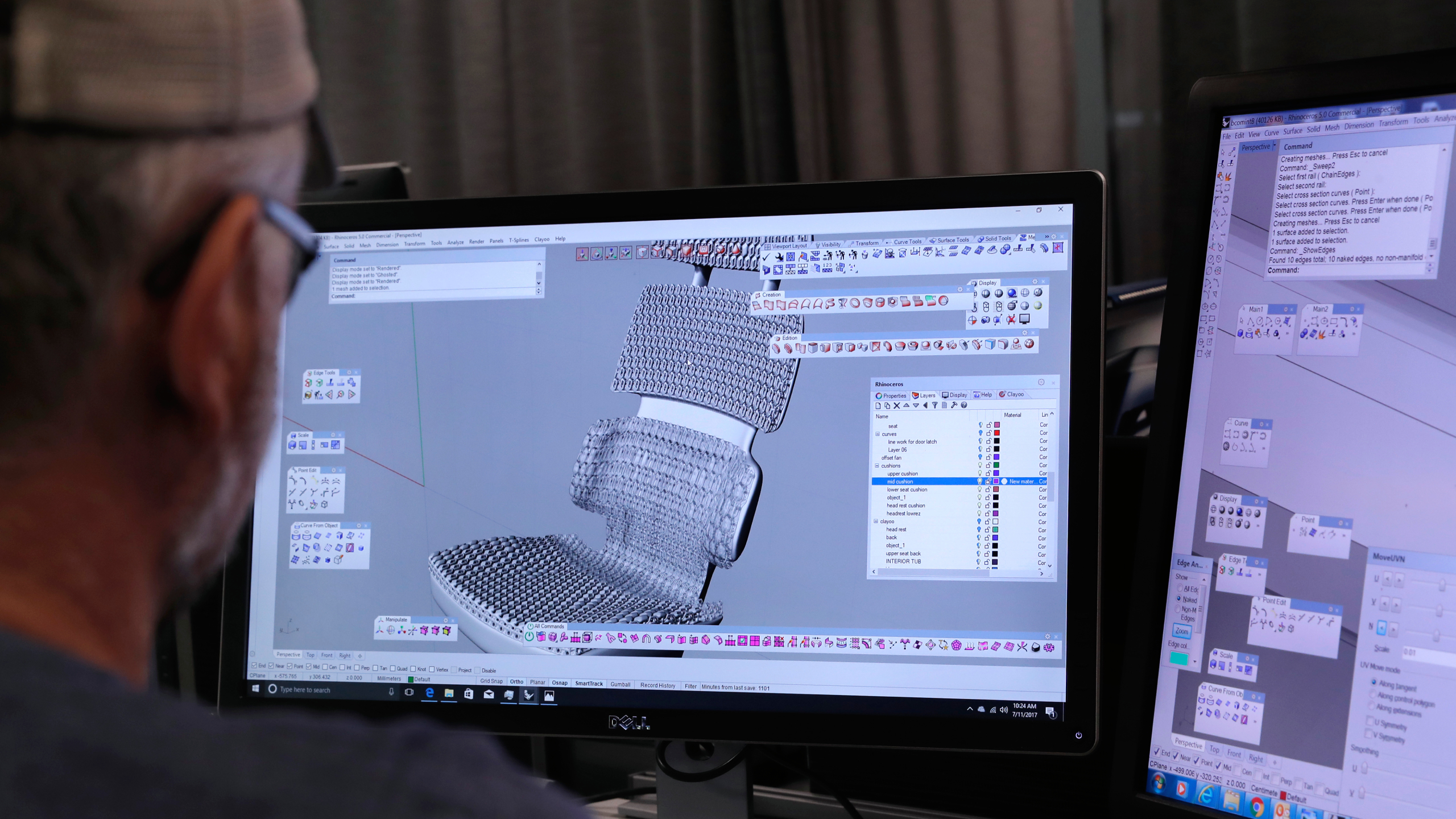 Digital designer, Karl Strahlendorf, displays an algorithmically designed 3-D printed seat back, at the Ford Research and Innovation Center in Palo Alto, Ca., on Tuesday July 11, 2017.