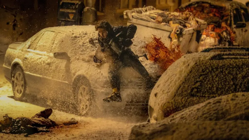 Bryan running from falling zombies in Zach Cregger's Resident Evil movie.