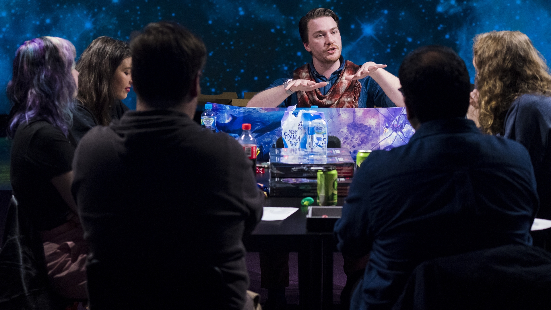 Dungeons &amp , Dragons players pay rapt attention to their Dungeon Master